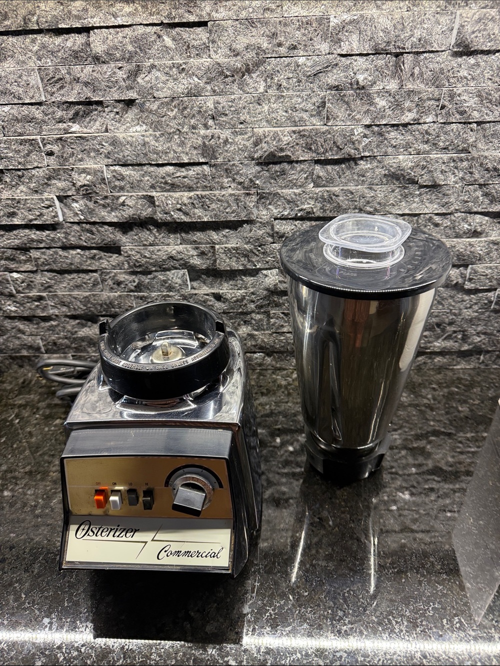 Vintage Osterizer stainless steel Blender and new in box extra container